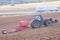 Case IH magnum tractor working beside highway in Germany