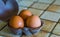 Case of three chicken eggs, popular animal food products, healthy source of protein
