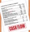 Cash Flow Rubber Stamp Text On White Paper And Oak Table