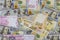 Cash money finance investment American dollars banknotes and Ukrainian Money
