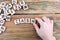 Cash. Wooden letters on the office desk, informative and communication background