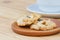 Cashew cookies on wooden desktop with copy space