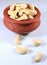 Cashew nuts in a clay bowl