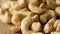 Cashew nuts rotating, macro shot. Top view