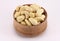 Cashews in a round wooden form