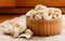 Cashews spilled out in a plate. Close-up