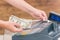 Cashier holdnig banknotes