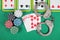 Casino chips a winning combination of cards flush royal next to the police handcuffs