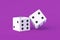 Casino games. Random winnings. Jackpot. Leisure entertainment for the whole family. Two dice cubes on violet background