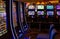 Casino machines in the entertainment area at night waiting for gamblers to come, play and bet