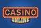 Casino Online Glowing Sign on Blue Background