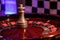 A Casino roulette wheel closeup with red and black numbers