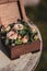 Casket with flowers om the table