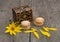 Casket, two linking of cookies and yellow flower