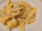 casoncelli or tortelli with poured butter and sage. Italian pasta.