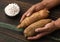 Cassava in the hands of Colombian farmer - Manihot esculenta