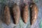 Cassava roots on rustic background