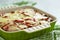 Casserole with meat, potato, tomato and cheese