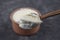 Casserole yogurt. Delicious yogurt scene with wooden bowl and sackcloth. Closeup shot of healthy fresh yogurt. Top view