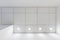 Cassette suspended ceiling with square halogen spots lamps and drywall construction in empty room in apartment, clinic, office or