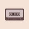 Cassette tape on the beige background. Audio tape. Cassette tape icon.