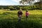 Cassilandia, Mato Grosso do Sul, Brazil - 02 28 2023: People trekking to a waterfall