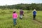 Cassilandia, Mato Grosso do Sul, Brazil - 02 28 2023: People trekking to a waterfall