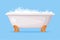 Cast Iron Bathtub on Claw Foot Pedestal Full of Water with Soap Bubbles Foam Isolated on Blue Background Vector