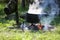 Cast iron cauldron boiling a goulash stew