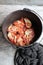 Cast Iron Dutch Oven Pasta Dinner On Wooden Background