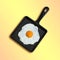 Cast-iron frying pan with fried eggs, half orange instead of yolk