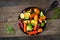 Cast iron skillet of roasted autumn vegetables