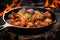 cast iron skillet with sizzling fried chicken