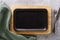 Cast iron tray with stand and cutlery on the table, top view. Food background