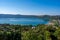 Castel Gandolfo, view on green Alban hills overlooking volcanic crater lake Albano, Castelli Romani, Italy in summer