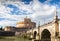 Castel Sant\'Angelo with bridge by day and blue sky