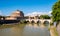 Castel Sant`Angelo mausoleum - Castle of the Holy Angel and Ponte Sant`Angelo bridge over Tiber river in Rome in Italy