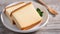 Castella - Delicious Japanese sliced sponge cake food on white plate over rustic wooden table, close up, healthy eating, copy