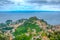 Castello di Taormina overlooking sicilian coastline and Taormina town, Italy