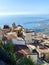 Castelmola, Italy views overlooking roof tops and the Ionian Sea