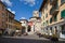 Castelnuovo di Garfagnana, Italy - View from the Via Vittorio Emanuele to the Rocca Ariostesca with Porta Calcinaia.