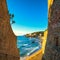 Castiglioncello sunset on cliff rock, beach and sea. Tuscany, It