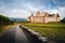 Castle of Aigle and vineyards landscape in swiss alps, Vaud Switzerland