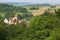 Castle Blumenberg amid mountains and farmland