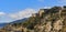 Castle of Bonifato and colorful old buildings on a hill in Ventimiglia in Italy, across from the French border