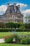 Castle built of rock with a huge garden of plants and vegetation