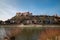 The castle in Burghausen with some bushes in the foreground