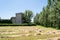 Castle in Castilla among a field of mowed cereal. Sotopalacios, Burgos, Castilla y Leon, Spain