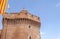 Castle, Castillet or porte Notre-Dame or Petit-Castillet, detail tower with catalan flag,iconic building in Perpignan.