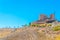 Castle at Consuegra surrounded with white windmills, Spain